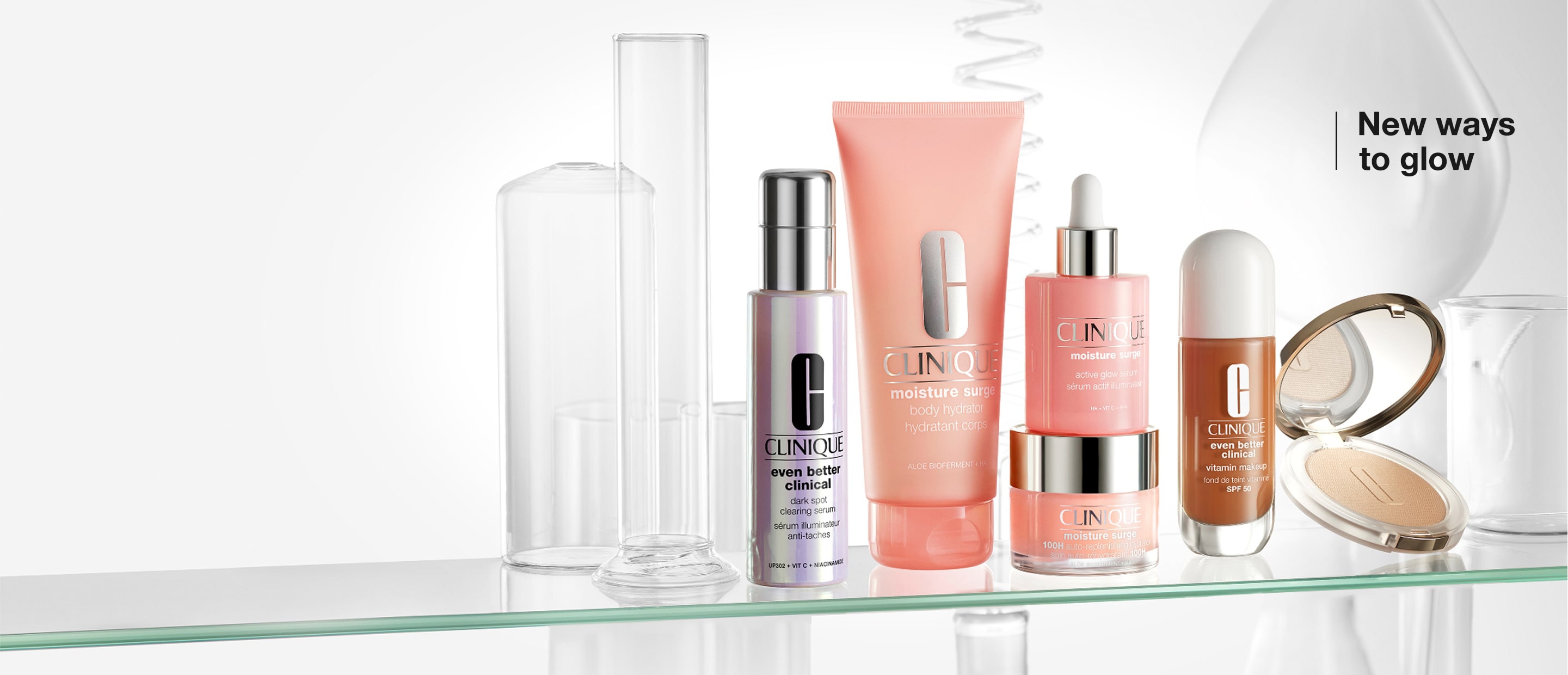Selection of glow essential products on a glass shelf in a brightly lit setting