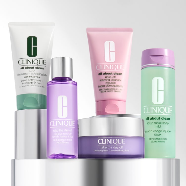 Selection of new brow and eye products dynamically placed on a glass shelf, in a brightly lit studio setting