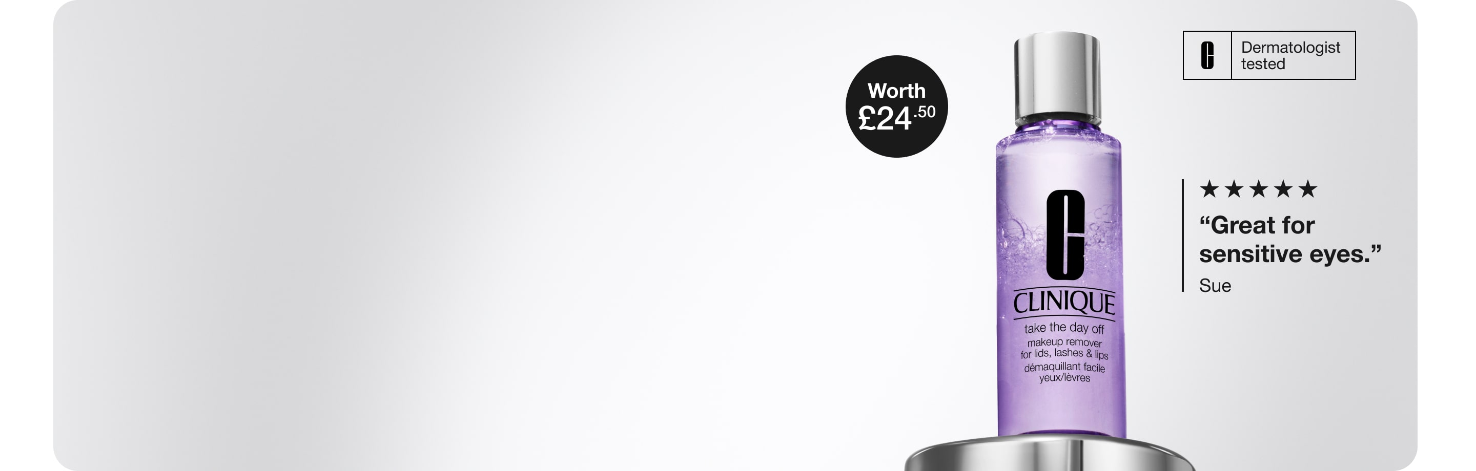 5 Clinique minis and a nude honey inspired makeup bag on a grey plinth, surrounded by silver balloons