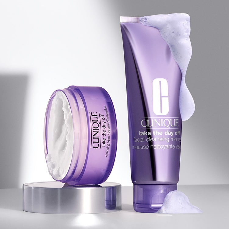 Selection of new brow and eye products dynamically placed on a glass shelf, in a brightly lit studio setting