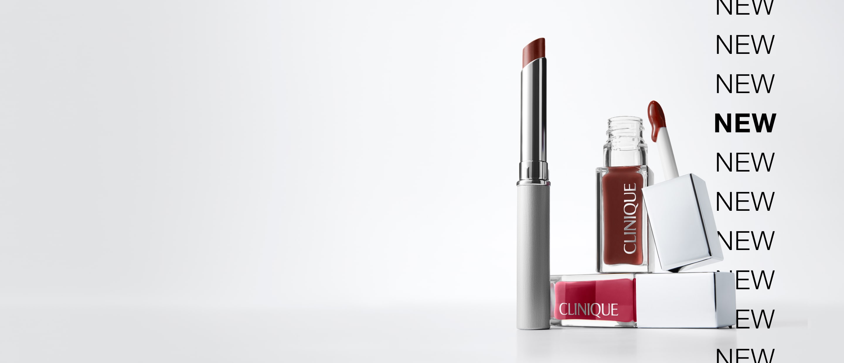 New Almost Lipstick in Nude Honey and Lip + Cheek Oil in a brightly lit setting
