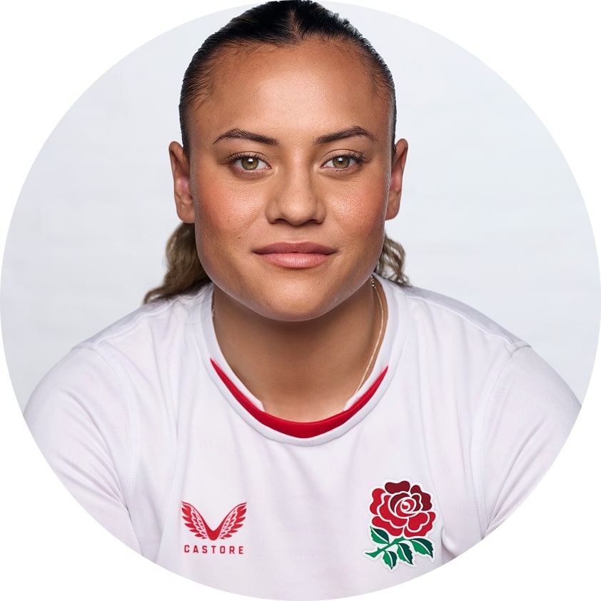 Headshot of Maddie Feaunati, smiling in front of a bright white background