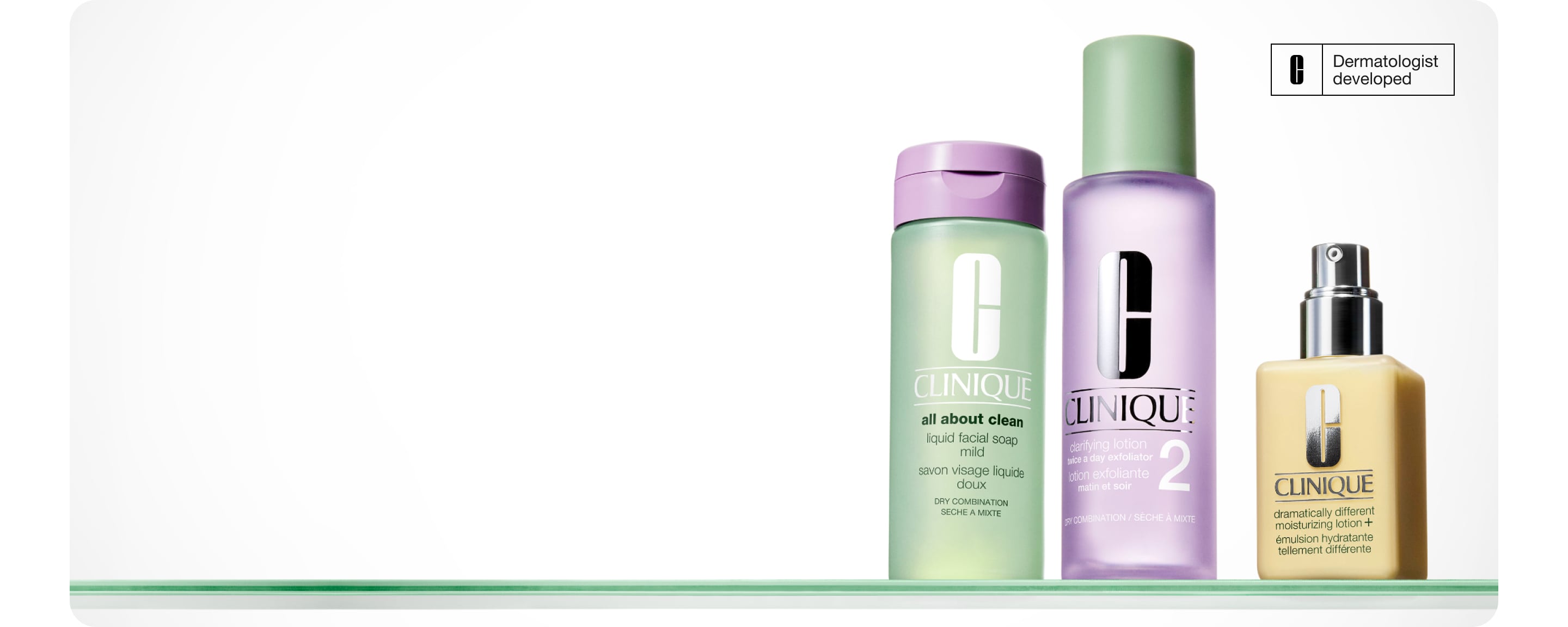 Clinique 3-Step Routine containing 3 products, on a glass shelf, in front of a soft grey background