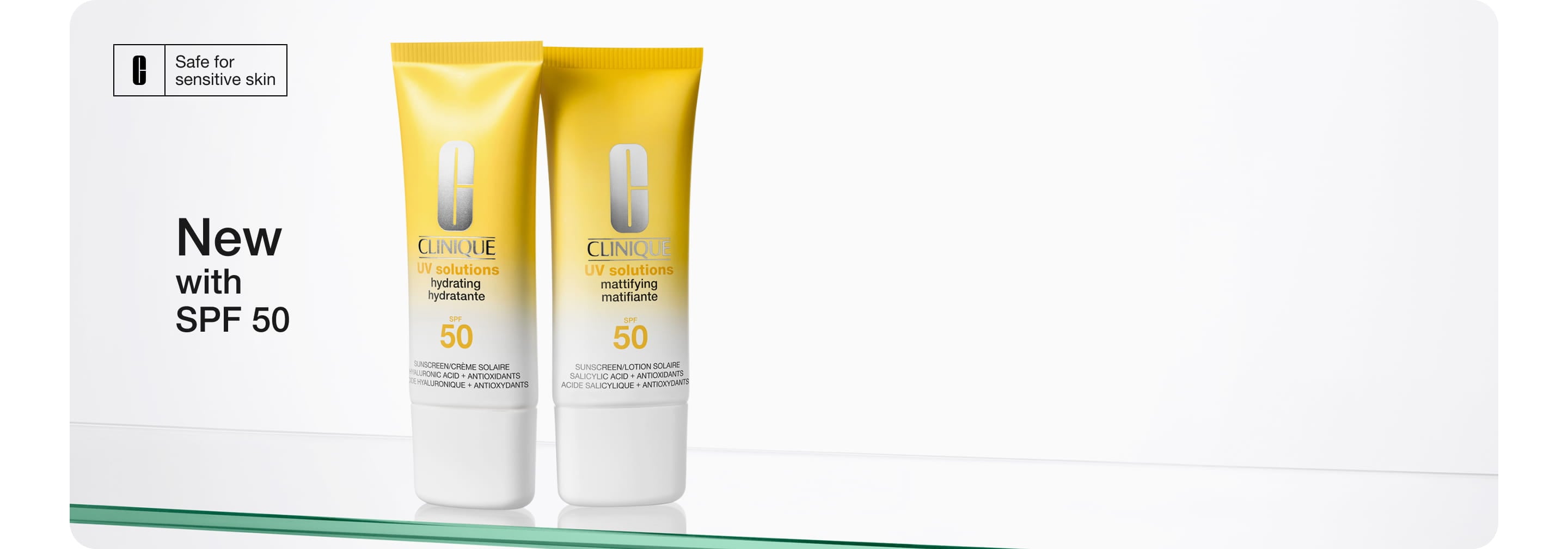 New Clinique UV Solutions Sunscreen SPF 50 in a brightly lit setting, next to glass discs in a brightly lit setting