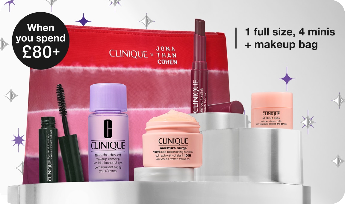 2 deluxe skincare minis on a grey plinth, surrounded by purple and silver star graphics