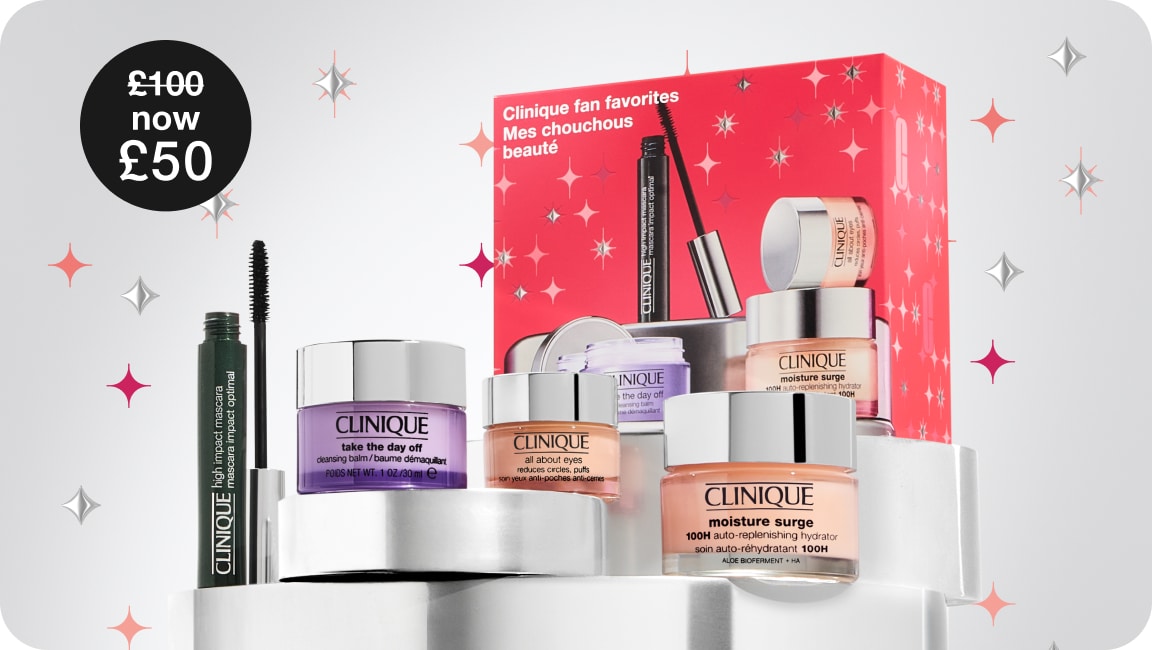 Dramatically Different Moisturiser Black Friday set, on a grey plinth, surrounded by green and silver star graphics