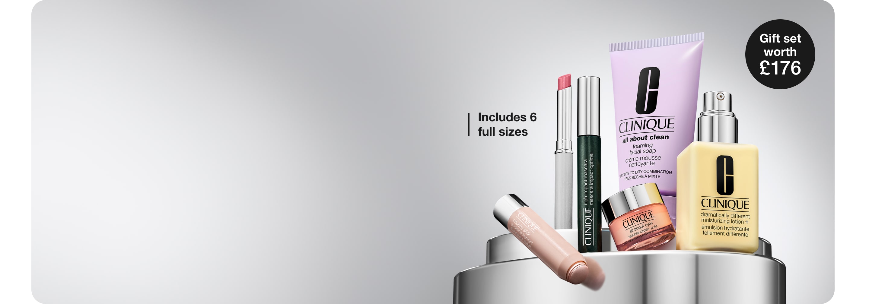 Full-size Moisture Surge Lip Treatment, shot from above, on a grey plinth in a brightly lit, clean setting