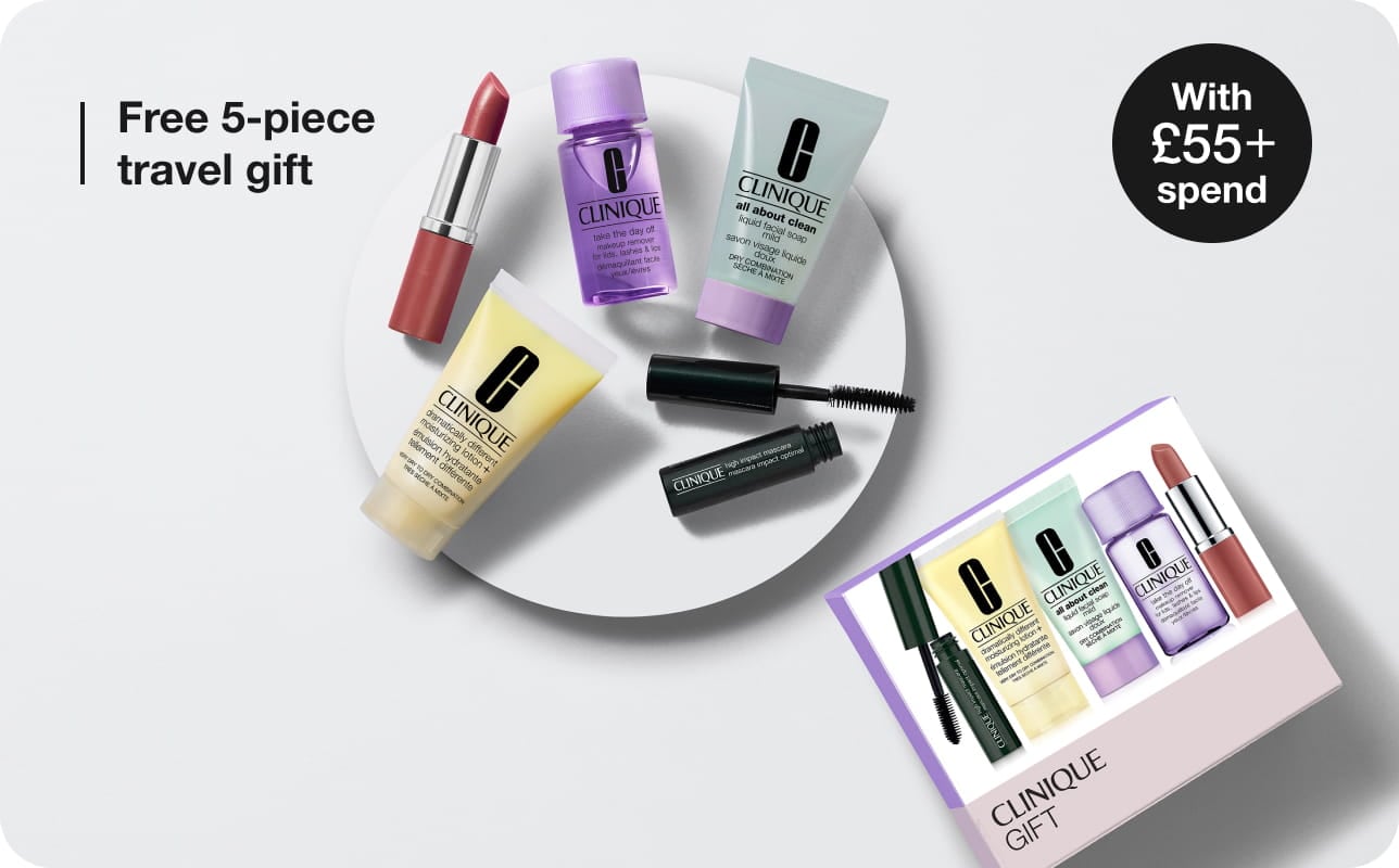 5 Clinique minis on a small grey plinth, next to a Clinique Gift box, shot from above in a bright setting
